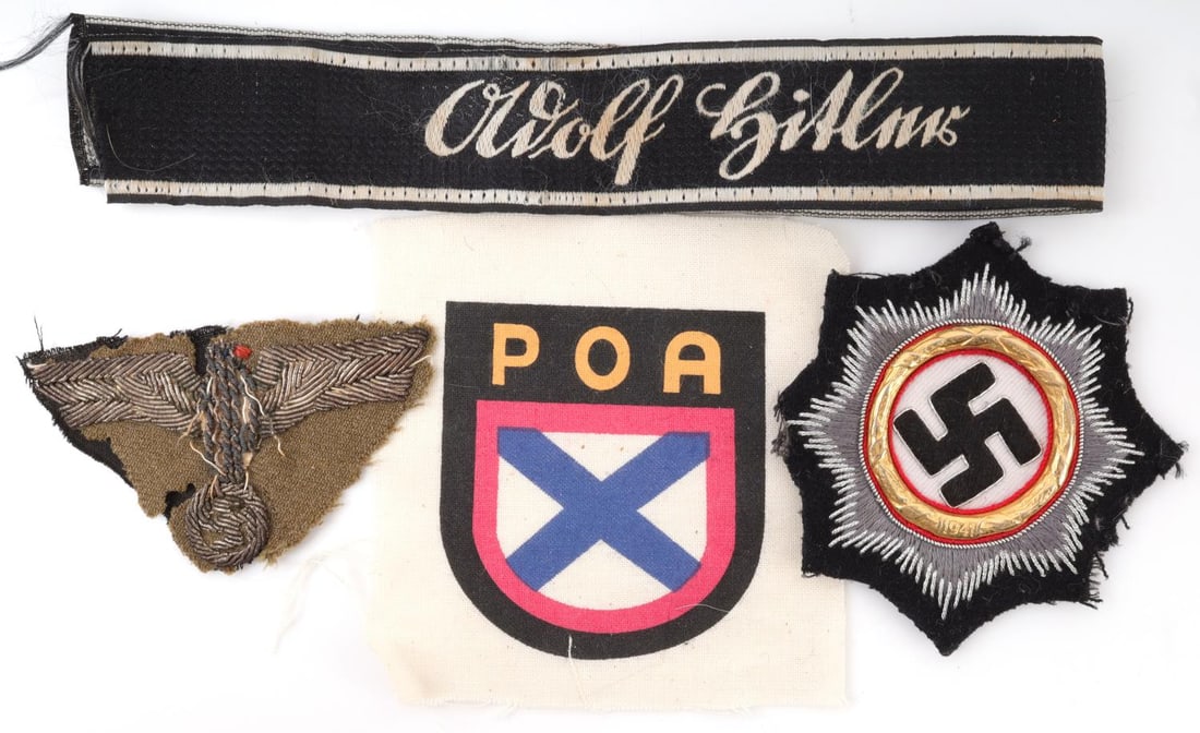 WWII GERMAN LOT OF PATCHES AND ARM BAND: Assorted lot of WWII German Third Reich patches and an armband. WWII Third Reich patch with German symbol. 2 7/8 inches. marked 1941. Fluoresces. German WWII patch for Russian volunteers, ROA. Non-flu