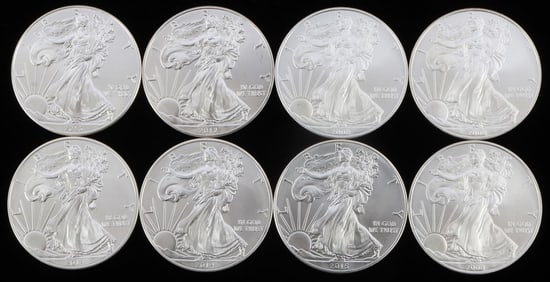 8 MIXED DATE 1 OZT SILVER AMERICAN EAGLE BU COINS