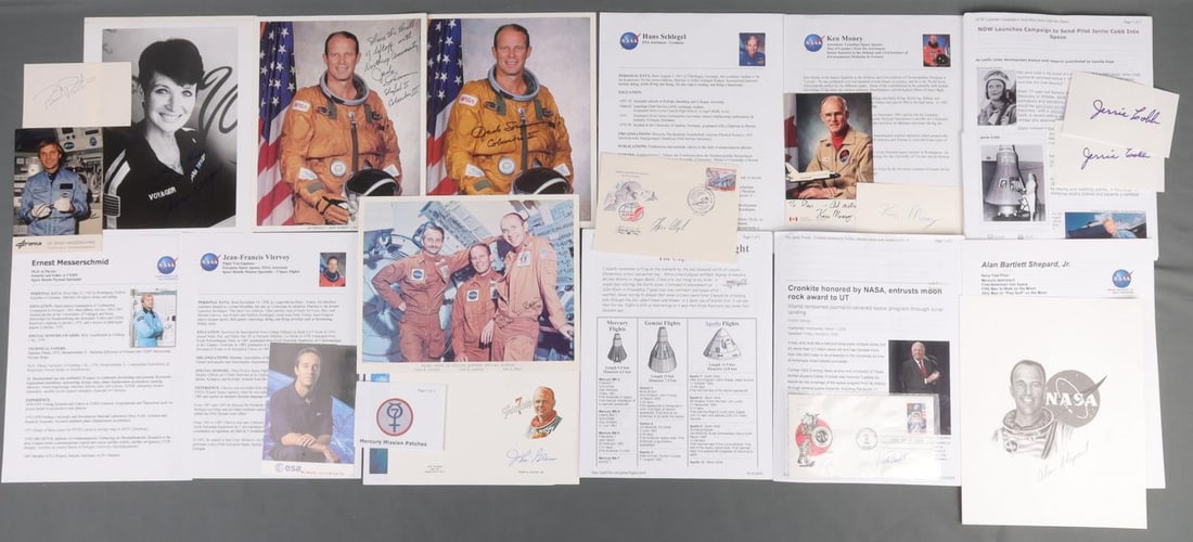 FOLDER OF ASTRONAUT & SPACE RACE SIGNATURES: A selection of autographs from militaria collector Bruce Cameron for inclusions of paintings by Ray Waddey. Individual signatures include Alan Shepard, John Glenn, and Walter Cronkite. Sixteen signatu