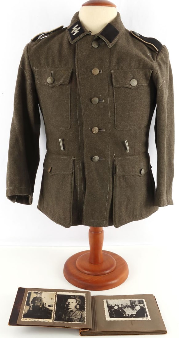 WWII LATVIAN WAFFEN SS M40 TUNIC THIRD REICH: WWII German SS m40 tunic. Includes collar tabs, Latvian patch, shoulder boards, Reichsadler patch. Size ink stamped right interior "40/65 97 43/53" Latvian patch fluoresces, may have been replaced. Co