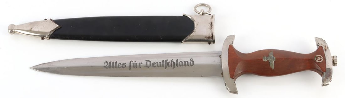 WWII GERMAN THIRD REICH NSKK DAGGER BY EICKHORN: Steel blade with etched motto. Reverse with Eickhorn maker mark RZM 1939 M7/66. Nickel crossguards with casting marks on interior. Tang is marked with H and C/A on inside of H. Inlaid eagle and SA run