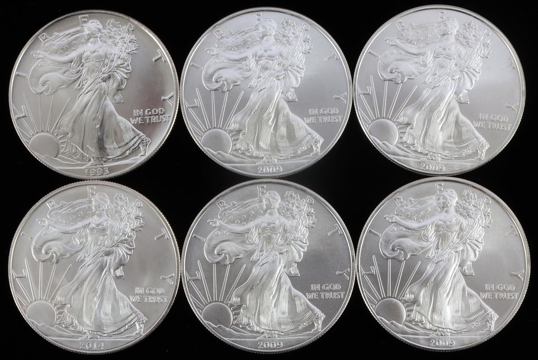 6 MIX DATE 1 OZT SILVER AMERICAN EAGLE BU COIN LOT: All brilliant uncirculated. Dates are 2014 (x1), 1993 (x1), and 2009 (x4). This lot has a reserve.