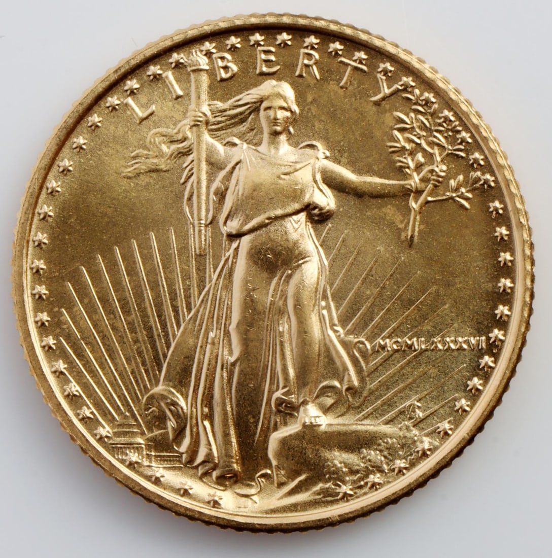 1986 GOLD 1/10 OZT OUNCE AMERICAN EAGLE BU COIN: Brilliant uncirculated. This lot has a reserve.