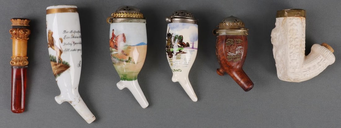 LOT 5 ANTIQUE GERMAN ENGRAVED TOBACCO PIPE BOWLS: Lot of FIVE (5) antique German tobacco pipe bowls made from porcelain, meerschaum, and wood construction. Engraved and printed. Includes one (1) mouth piece. Sizes range from 3.25 - 5 inches. All item