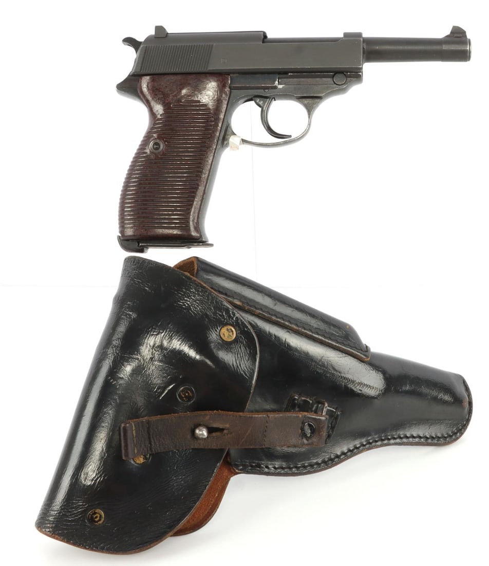 WWII REFURBISHED WALTHER P38 P1 9MM LUGER PISTOL: Wartime blued steel frame P38 with Third Reich inspection mark and grooved bakelite grips. Arsenal refurbished with parkerized P1 steel slide and barrel. Includes one (1) magazine and black leather ho