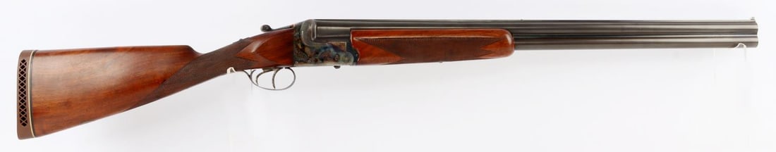 ABERCROMBIE & FITCH BELGIAN 12 GAUGE O/U SHOTGUN: Factory engraved Abercrombie & Fitch over under shotgun by Francotte, 12 gauge, 2-3/4 inch. Blued 26-inch barrels. Case hardened sidelock action with ejectors, cross bolt and dual trigger assembly. Ch