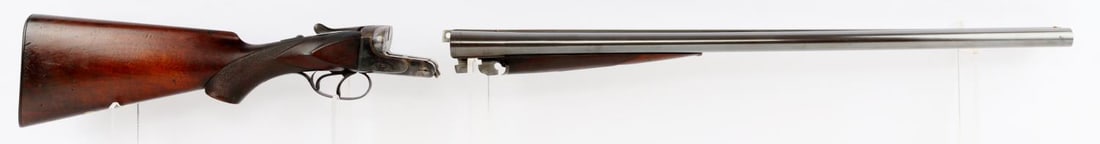 PRUSSIAN JP SAUER 12 GAUGE SIDE BY SIDE SHOTGUN: Factory engraved J.P. Sauer & Son side by side double barrel shotgun, ca. 1905. 12 gauge, 2-1/2 inch. Blued 26-inch barrels, case hardened box lock action with ejectors, cross bolt and dual trigger as
