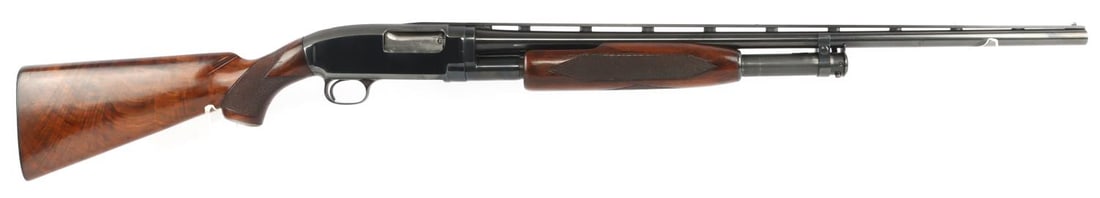 1954 WINCHESTER MODEL 12 SKEET 28 GAUGE SHOTGUN: Winchester Model 12 Skeet pump-action shotgun, 28ga, 2-7/8 chamber. 26-inch blued barrel with matted, ventilated top rib. Top of receiver also matte. Checkered burl wood stock. Very good condition. Fu