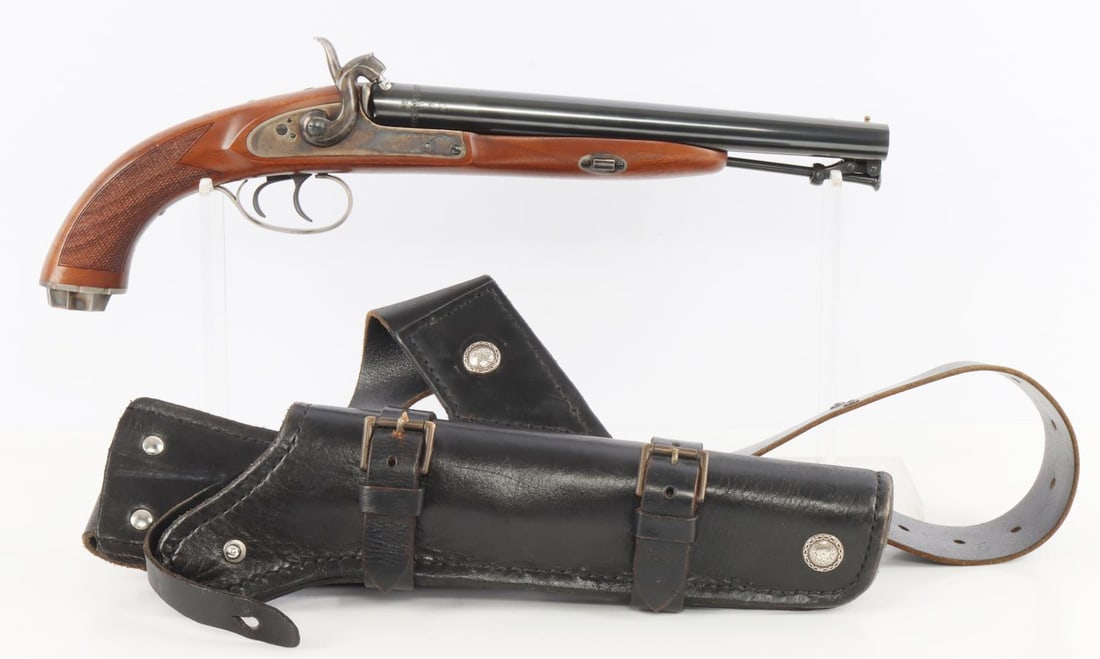 PEDERSOLI HOWDAH HUNTER BP SHOTGUN & HOLSTER: Pedersoli Howdah Hunter black powder percussion shotgun. Side-by-side 11.25-inch blued barrels, engraved case hardened lock plates and checkered wood grip. Smooth bore, compatible with buckshot, slugs