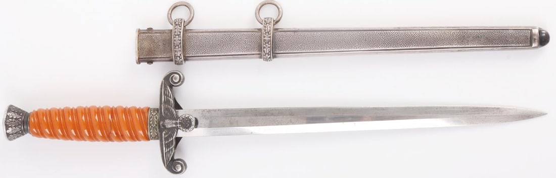 WWII GERMAN THIRD REICH HEER OFFICER DAGGER: Steel blade with Alcoso maker mark. Bakelite grip is split in half, but held firmly in place when pommel is screwed in. Tang is period. Pommel and crossguard. 14 5/8 inches. Very good, original condit