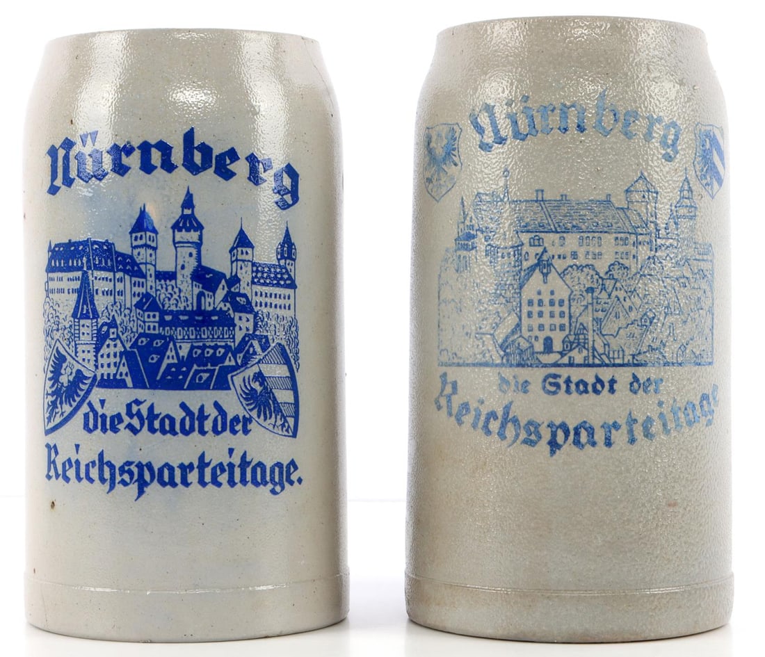 LOT OF 2 WWII GERMAN REICH REICHSPARTEITAGE STEINS: Lot of TWO (2) Reichsparteitage beer steins. Each stein bears the statement, 'Nurnburg die Stadt der Reichsparteitage.' 1 liter. Good condition.