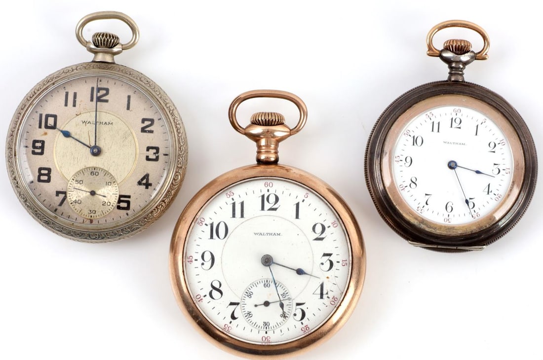 ANTIQUE WALTHAM OPEN FACE POCKET WATCH LOT OF 3: Lot of THREE (3) antique Waltham pocket watches. 1) Watch with nickel alloy case and floral relief, movement serial 26235941, size 16s, DSD, DMK, 7j, SW LS. 2) Watch with coin silver case with ridges,