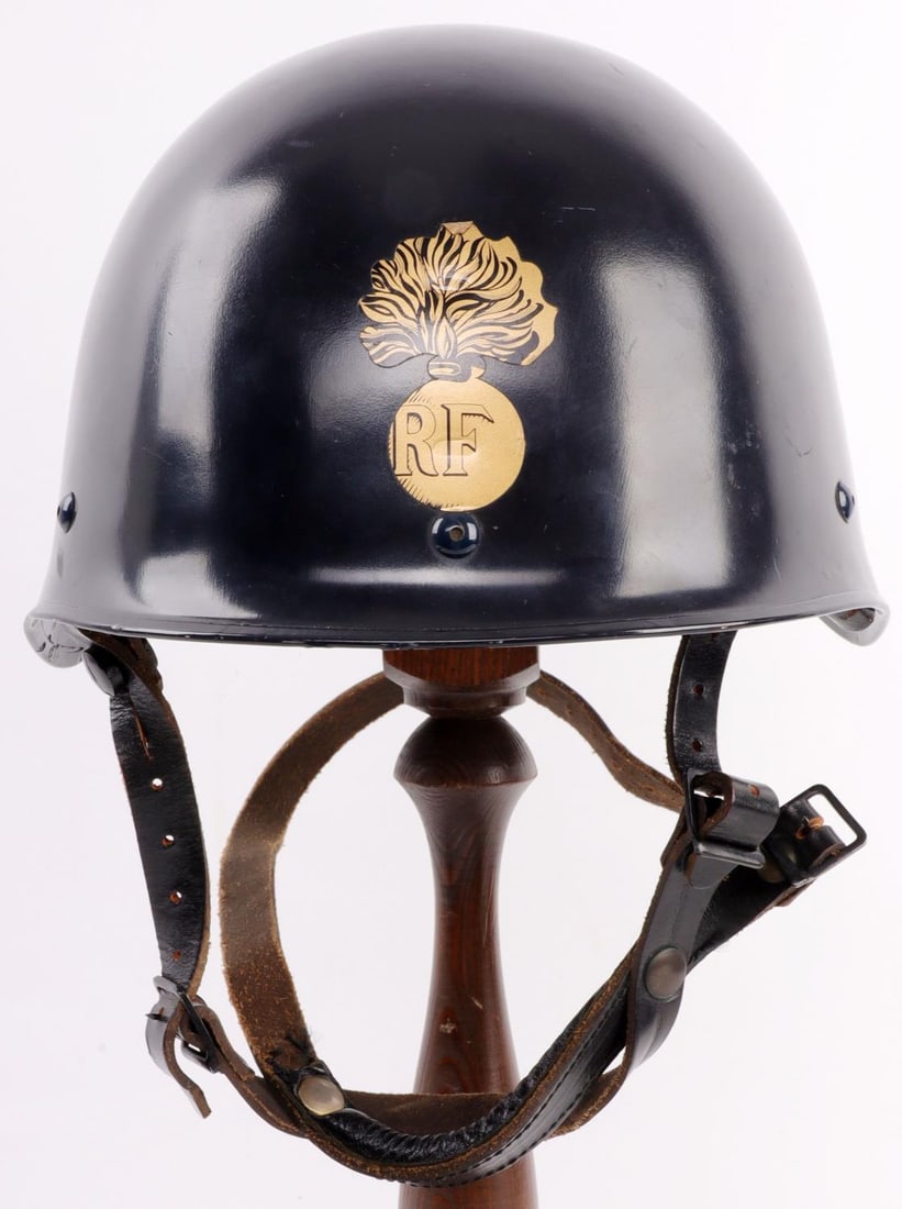 FRENCH ARMY POLICE STEEL HEAVY HELMET F1 M1978: French F1 Model 1978 steel helmet painted dark blue. Interior stamp indicates a 1979 Dunois helmet. Includes original liner with leather sweatband and chin strap. Front has misprinted Adrian helm flam