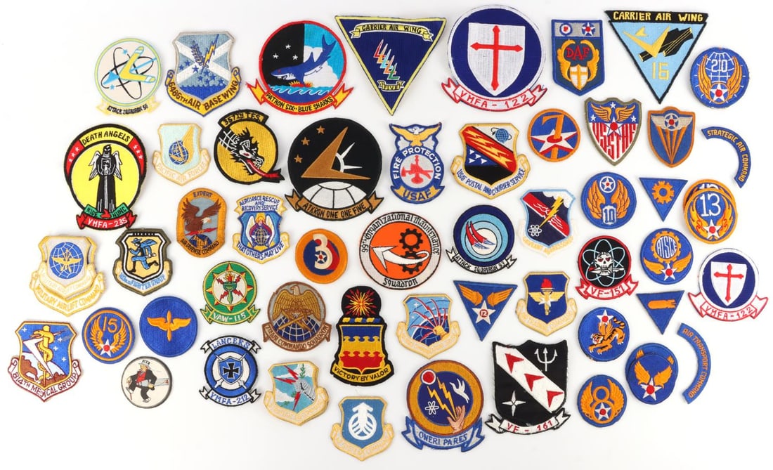 LOT 57 WWII US ARMY AIR CORPS USAAF USMC PATCHES: Lot of fifty-seven (57) embroidered uniform patches, primarily US Army aviation and Marine Corps. All in good condition.