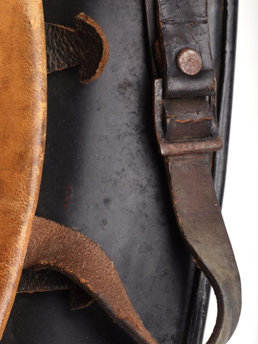 WWII GERMAN THIRD REICH POLICE STAHLHELM HELMET: WWII German Reich M34 Fire Police(Feuerschutzpolizei) Stahlhelm Helmet. Features two (2) decals on either side, both have deteriorated with age. Full leather liner interior with nine (9) fingers and l