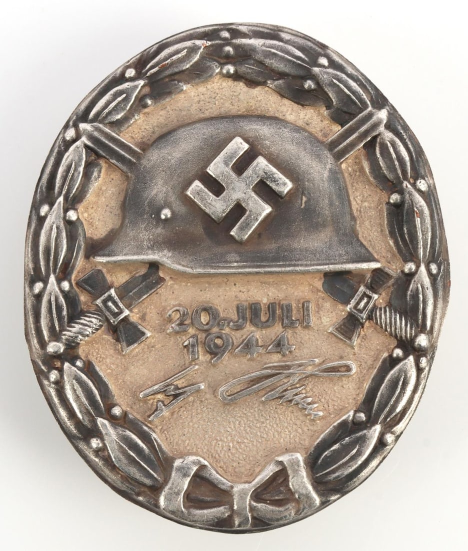 WWII GERMAN THIRD REICH JULY 20 WOUND BADGE: High-quality post-war construction. Marked 800 and L/12. 1 5/8 inches. This lot has a reserve.