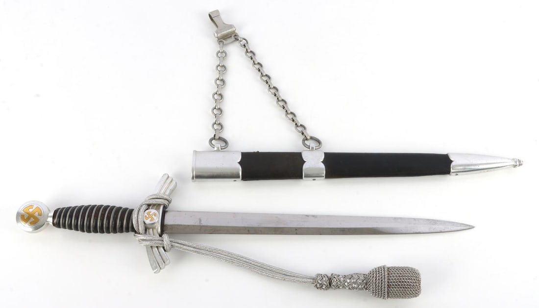 WWII GERMAN THIRD REICH LUFTWAFFE 1ST MODEL DAGGER: Nickel-plated steel blade with E.F. Horster maker mark. Aluminum crossguard and pommel. Leather bound grip. Includes chain marked Ges Gesch and OLC. Grip cannot be removed to verify tang without force