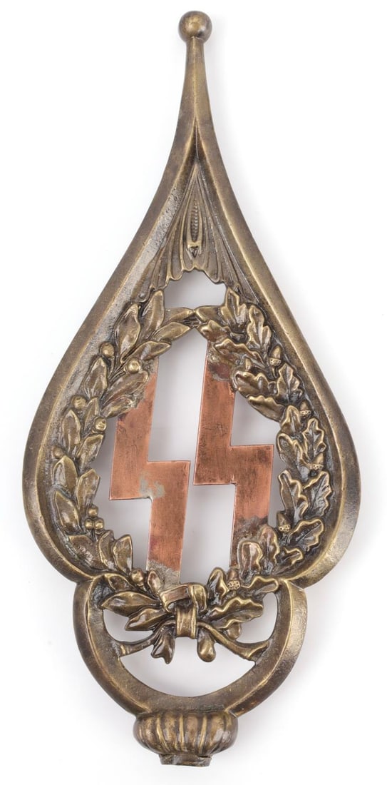 WWII GERMAN THIRD REICH BRASS SS FLAG POLE FINIAL: WWII German Reich Brass Schutzstaffel Flag Pole finial. Brass single-piece construction. Features a wreath surrounding SS runes. Size approx. 8.5 inches. Finial is in good condition. Unauthenticated,