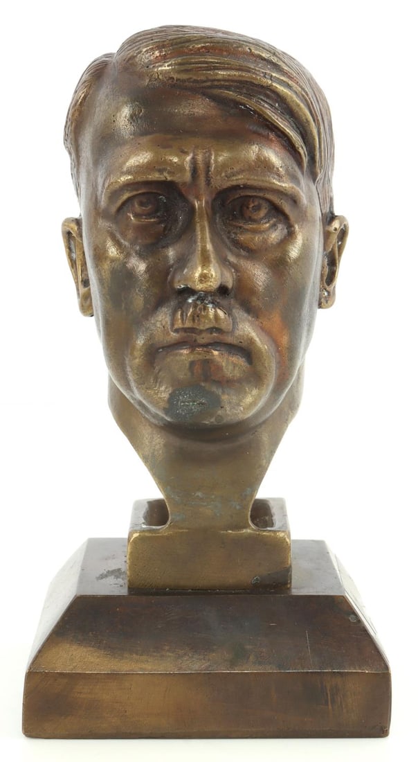 WWII GERMAN REICH H.M LEY ADOLF HITLER BRONZE BUST: WWII German Reich Adolf Hitler Bronze desk bust by H.M. Ley. Reverse features the stamp, "H.M. Ley"(1888-1974), for the maker. Bust is approx. 2.5 inches wide at the base and 4.75 inches tall. Bust is