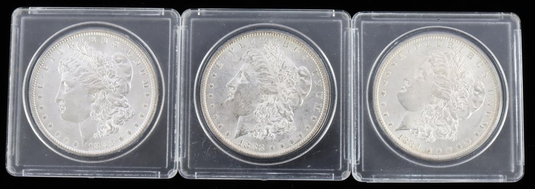 LOT OF 3 BU MINT STATE MORGAN SILVER DOLLAR COINS: Lot of three (3). All Brilliant uncirculated, mint state examples. Includes two (2)1883 O and one (1) 1884 O. This lot has a reserve.
