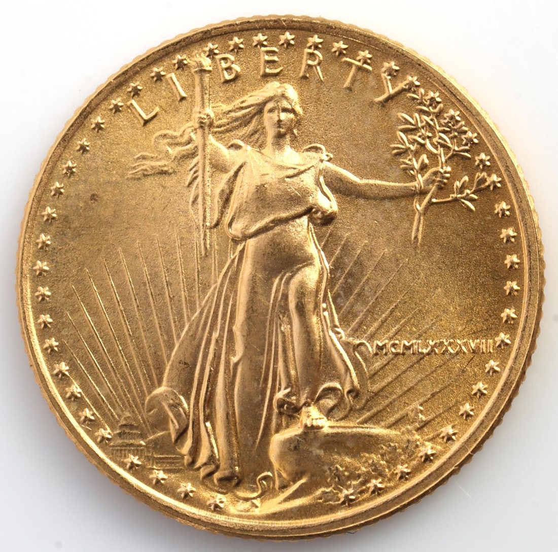 1987 GOLD 1/10 OZT OUNCE AMERICAN EAGLE BU COIN: Brilliant uncirculated. This lot has a reserve.