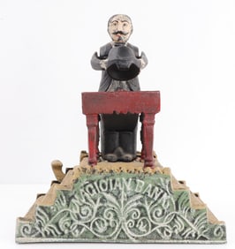 CAST IRON MECHANICAL MAGICIAN PIGGY BANK