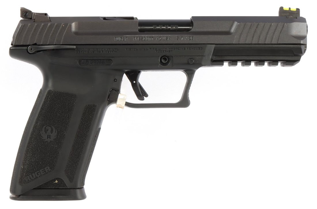 RUGER 57 5.7 X 28 SEMI AUTO PISTOL IN CASE: In good, used condition. Parkerized finish with composite frame. 5-inch barrel. Fixed front fiber optic sight. Rear adjustable sight. Textured grip points. Includes one (1) 20-round magazine and origi