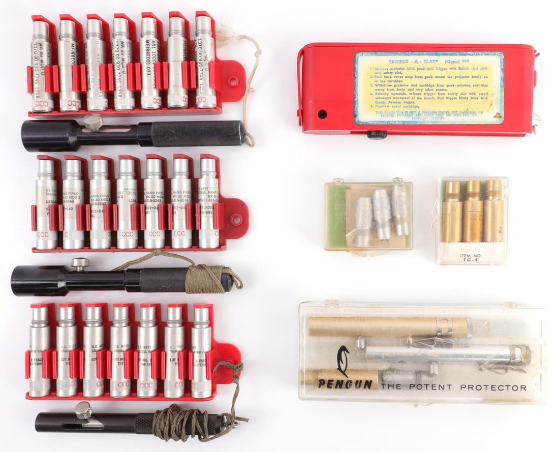 VINTAGE US NAVY S&W FLARE PEN SIGNAL KIT LOT 9 PCS: Lot of NINE (9) pieces. Includes two (2) Vietnam War-era signal kit flare pen launcher assemblies (6000-D-4040-3 & 6000-D-4040-5), one (1) U.S. Navy BuWeps-marked pencil type signal projector Mk31 Mod