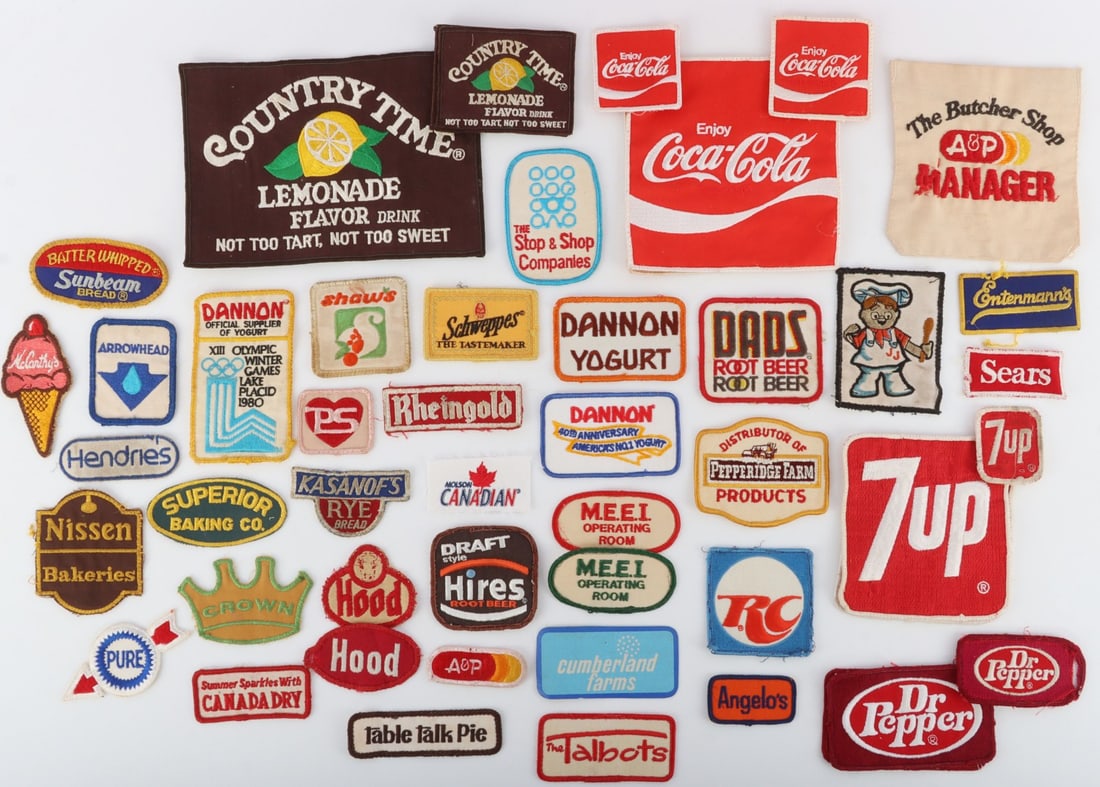 LOT OF 48 CORPORATE BRAND ADVERTISING PATCHES: Lot of FORTY EIGHT (48) advertisement patches for various brands and corporate entities. Includes Coca-Cola, 7-Up, Dr. Pepper, Dannon, Country Time, Talbot's, and Sun Bread. Most appear to date from t