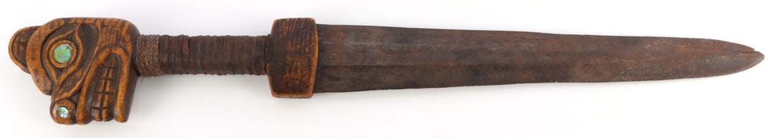 PACIFIC NW TLINGIT IRON DAGGER W BEAR HEAD POMMEL: Tlingit/Haida Northwest Coast Native American wrought iron dagger. Double-edged trapezoidal blade. Broad and flat reverse, striated. Wrapped grip with convex wood crossguard. Carved wood bear's head p
