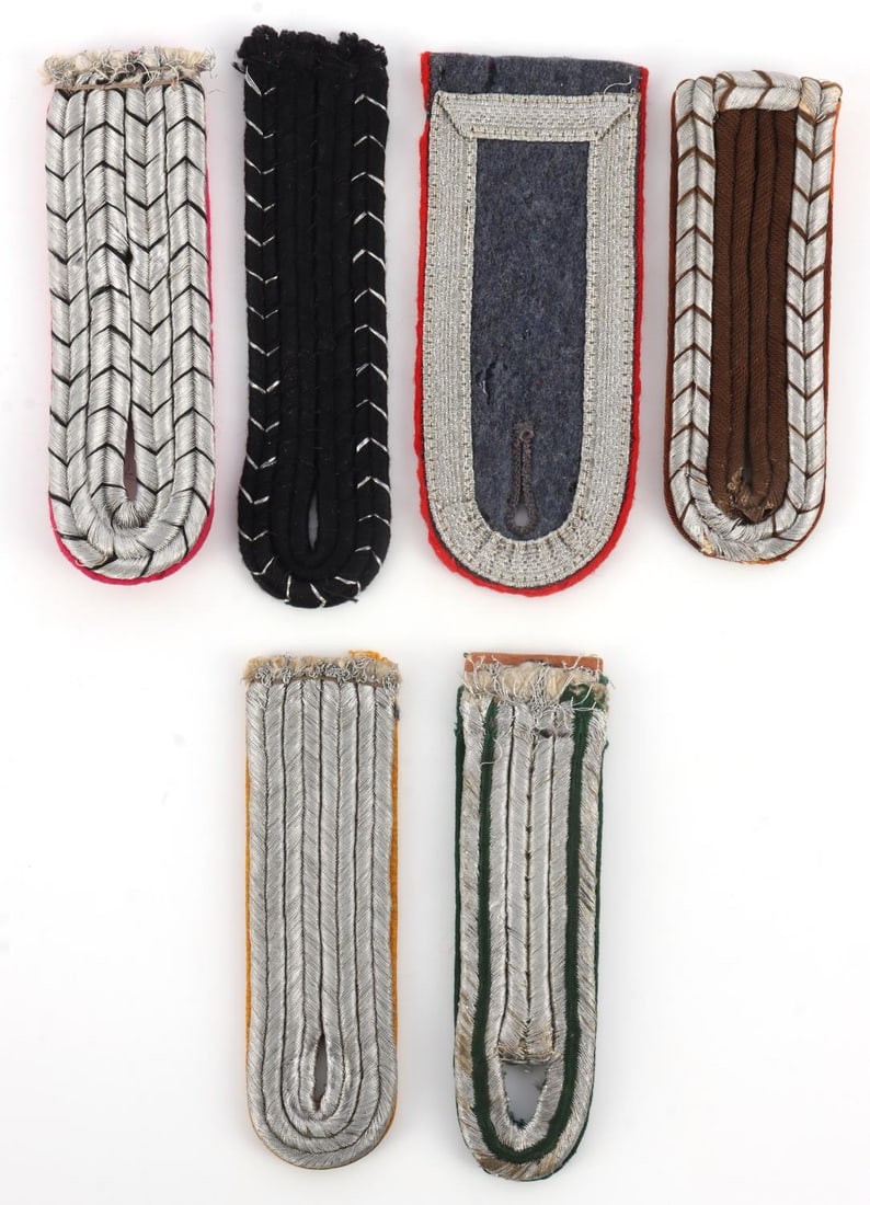 LOT OF 6 VINTAGE GERMAN SHOULDER BOARDS: Lot of SIX (6) includes: Luftwaffe NCO Artillery (4.5 X 1.75 inches), Luftwaffe Lt. Paratrooper / Flight (4 X 1.25 inches), Schutzpolizei Unterwachtmeister (4.75 X 1 inches), Feuerschutzpolizie (4.5 X