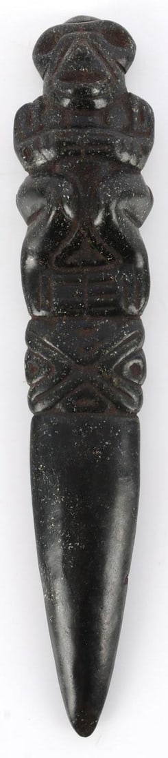TAINO PRECOLUMBIAN DAGGER WITH EFFIGY HANDLE: Incised crouched figure on ceremonial blade. It measures 6 7/8 inches. Very good condition. This lot has a reserve.