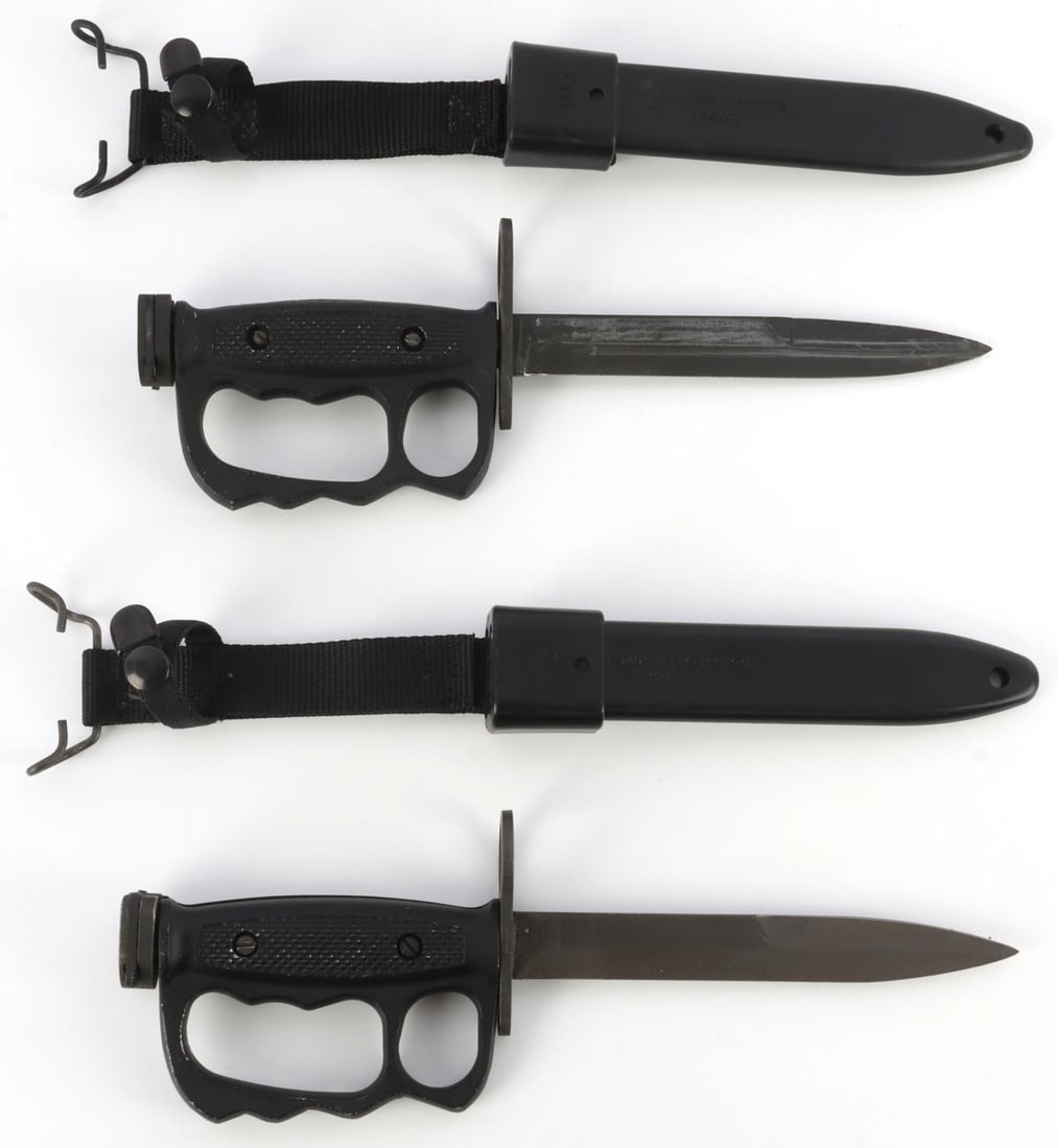 LOT OF 2 M7 BAYONET M10 SCABBARD M4 RIFLE KNUCKLES: Lot of TWO (2) M7 bayonets with knuckle duster scabbard. 1) Maker's mark, "US. M7, Imperial." Plastic sheath stamped, "M10, 19204 ASSY 8448476 MFG 1Z803." 2) Maker's mark, "US. M7." Plastic sheath sta