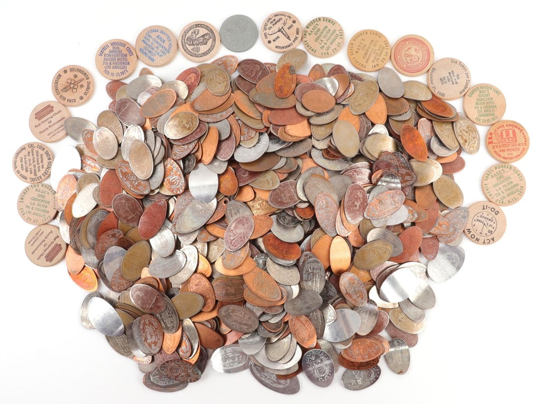 BAG OF WOOD TOKENS FLATTENED PENNIES TOKENS: Bag of various collectible coins, flattened pennies, wooden coins, and other exonumia. Nearly all items are in good condition or better.