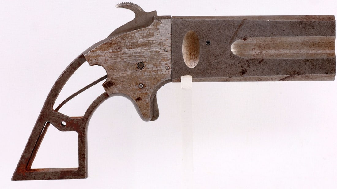 TWISTER OVER UNDER .36 CAL PERCUSSION DERRINGER: Classic Arms Twister rotating barrel spur trigger kit pistol. Muzzle-loading, smooth bore, percussion cap ignition. 3.5-inch barrel. Good condition. Mechanically OK, functions without issue. Missing g