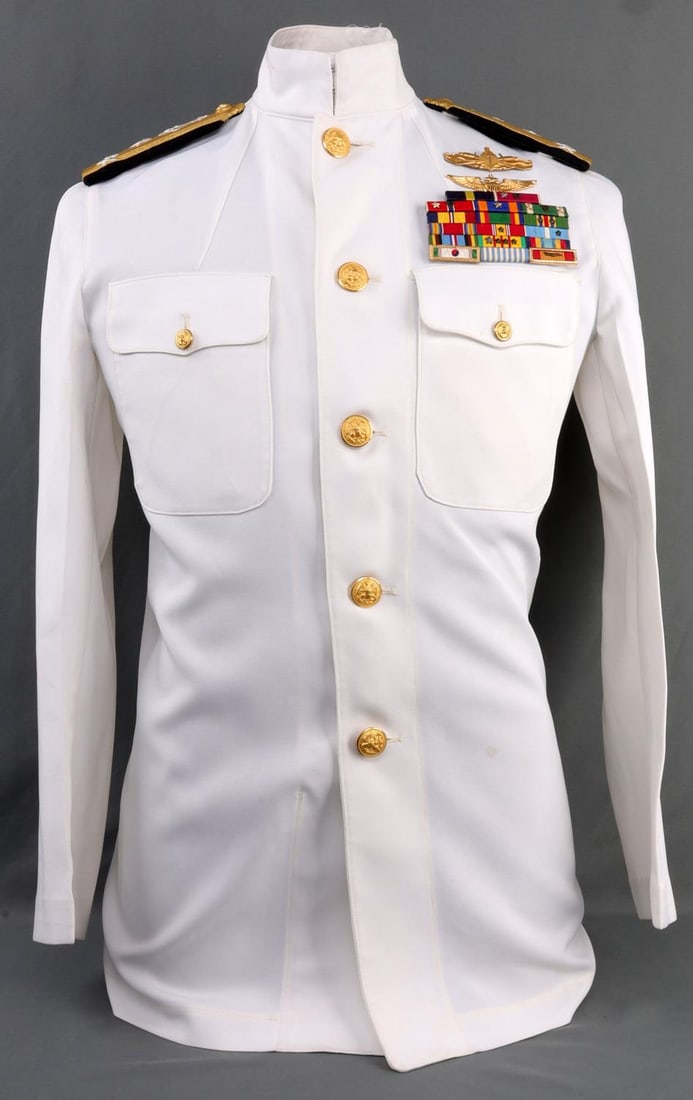 VICE ADMIRAL EDWARD S. BRIGGS WHITE DRESS TUNIC: Highly decorated including Bronze star with combat Valor device, Vietnam and Korea campaign and more, about a size 40. Clean and original condition