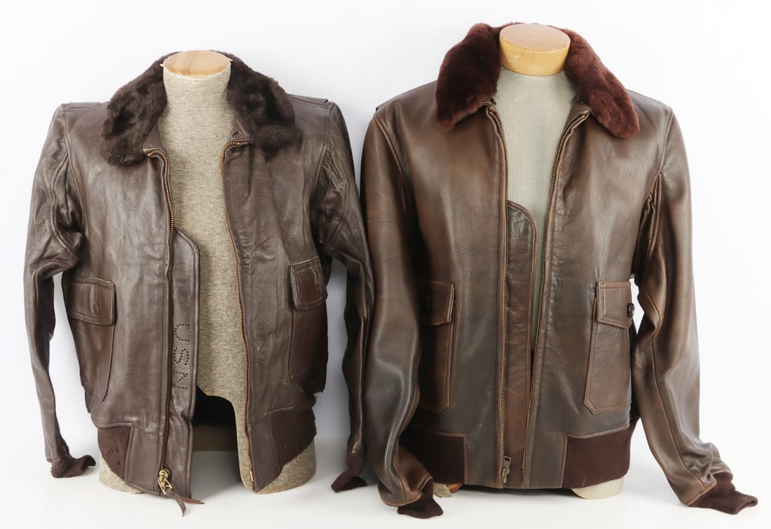 LOT OF 2 ANTIQUE US NAVY G-1 LEATHER JACKET: Lot of TWO (2). 1) US Navy Flyer's Jacket. Intermediate type G-1. Size 44. Cuff damaged, new cuff included. Very good condition. Stamped "USA". 2) US Wings Contemporary Leather Jacket, 100% antique la