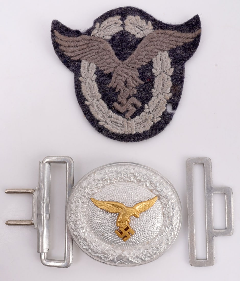 WWII GERMAN REICH LUFTWAFFE BUCKLE & PATCH: Aluminum belt buckle with gold eagle and pilot/observer patch in wool. Non-fluorescing. Patch measures 2.5 inches. Buckle measures 3 inches.