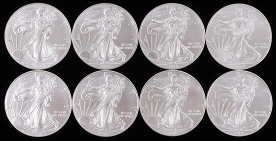 LOT OF 8 MIXED DATE SILVER AMERICAN EAGLE BU COINS