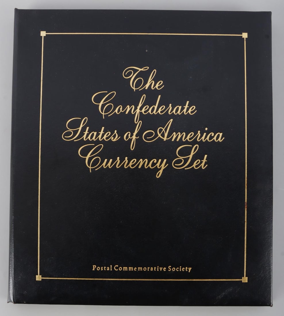 THE CONFEDERATE STATES OF AMERICA CURRENCY SET: Book of 8 CSA notes, all VF or better, in Postal Commemorative Society book with complete descriptions of each note. Includes 1864 $1.00, 1862 $20.00, 1864 $2.00, 1864 $50.00, 1863 $5.00, 1864 Fractio