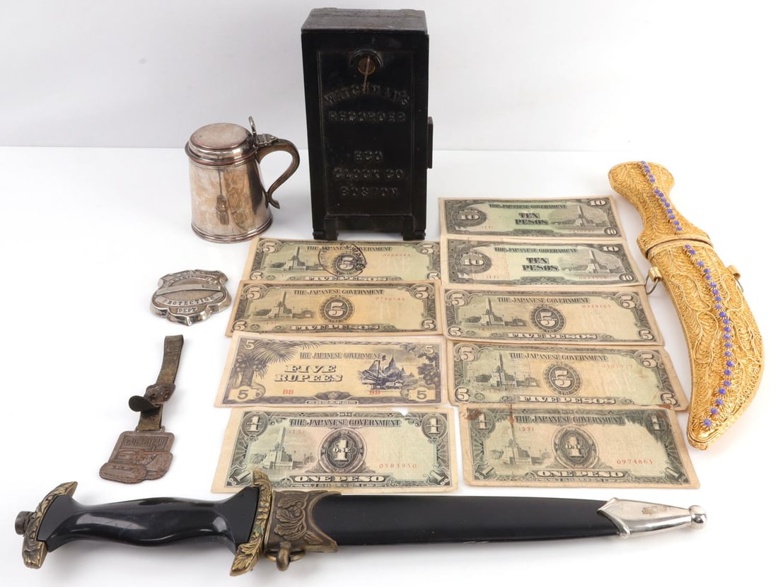 ANTIQUE LOT WESTERN CARTRIDGE BADGE DAGGER: Includes two (2) reproduction daggers, Detex Watchman Recorder with keys, Western Cartridge Co. Protection Dept. Badge, Caterpillar watch fob, and plated pot, and WWII Japanese invasion notes.