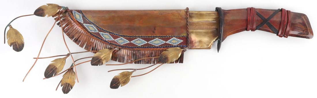 JAY TSCHUDY FRONTIER KNIFE COPPER METAL SCULPTURE: #6 / 250. Artist signed. Biography of artist on reverse. 6.75 inches (W) X 20.5 inches (L).
