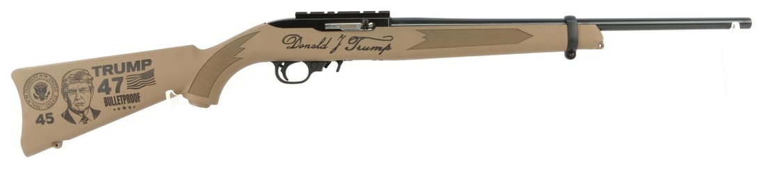 RUGER 10/22 TRUMP 2.0 LIMITED EDITION .22LR RIFLE: New in box Ruger 10/22 Trump 2.0 rimfire rifle, 47th president commemorative edition. Blued 18.5-inch barrel. Synthetic FDE stock. Includes one (1) 10rd box magazine. FFL required for transfer. No int