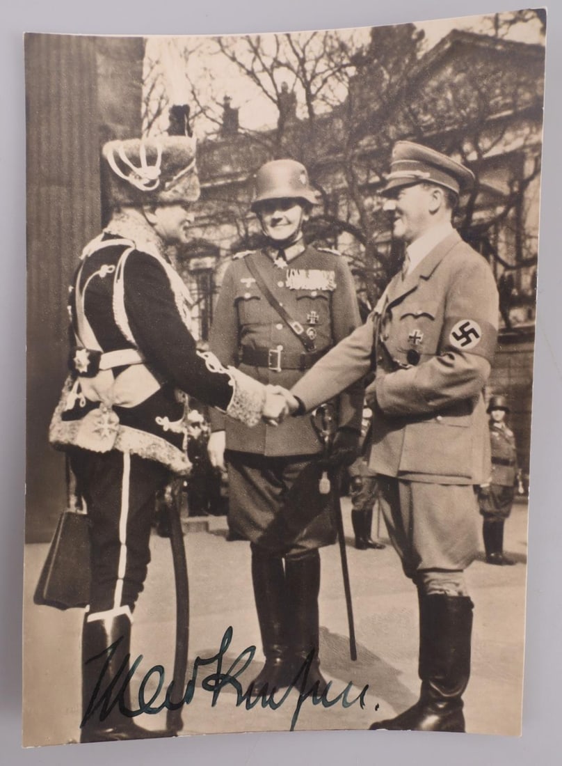 WWII GERMAN REICH AUGUST VON MACKENSEN SIGNATURE: Photograph of WWI Field Marshall August von Mackensen in a hussar uniform shaking hands with Adolf Hitler. Signed on the bottom by Mackensen. Signature has been deemed authentic according to terms. Ve