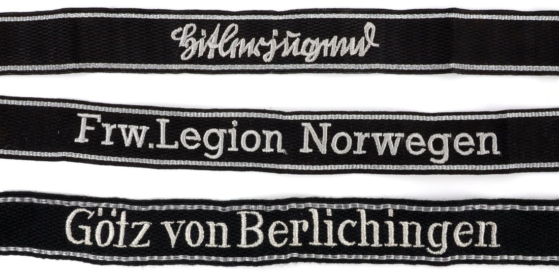 LOT OF 3 WWII GERMAN THIRD REICH CUFF TITLES: Lot of THREE (3). 1) Hitlerjugend cuff title. Silver metallic thread and rayon. 19 inches. 2) Gotz von Berlichingen Silver metallic thread and rayon. 17.5 inches. 3) Frw. Legion Norwegen cuff title. S