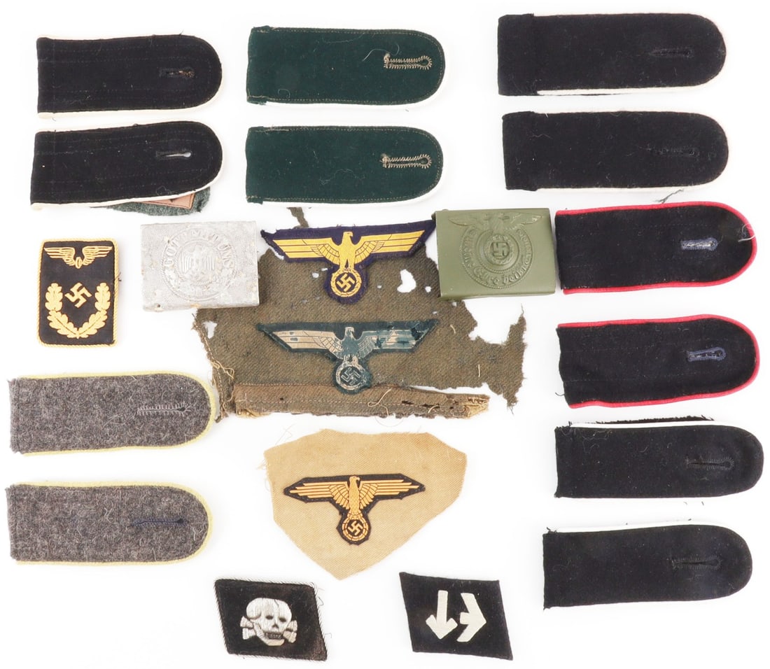 WWII GERMAN REICH LOT OF PATCHES BUCKLES AND MORE: Lot features shoulderboards, Heer patches, a railway collar tab, belt buckle, and more. Some shoulderboards fluoresce. Very good condition.