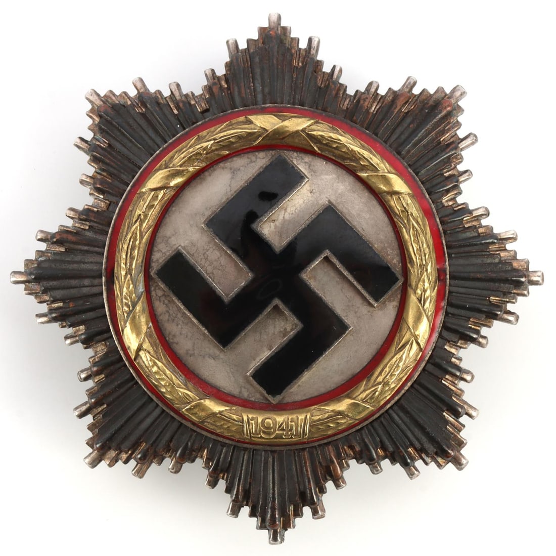 WWII THIRD REICH GERMAN CROSS IN GOLD: Otto Klein make. Multi-piece construction with black enameled swastika. 2.5 inches. Very good condition. This lot has a reserve.