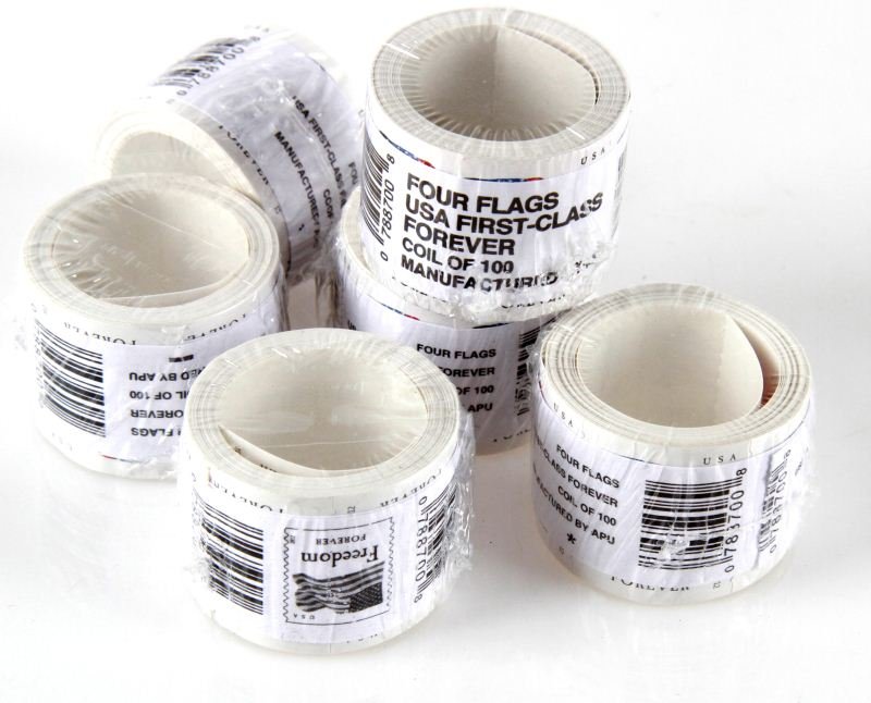 6 FOUR FLAGS USA FIRST CLASS FOREVER COILS OF 100: Six hundred first class forever stamps. New in shrink wrap.