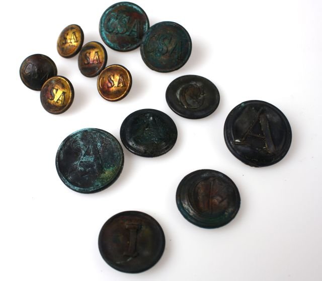 CSA CONFEDERATE STATES BUTTON LOT OF 13: Collection of CSA buttons six large 20 to 23mm, and 5 coat buttons, two of the larger buttons are complete and six with considerable damage, the five coatee buttons are very good, ex dealer stock with