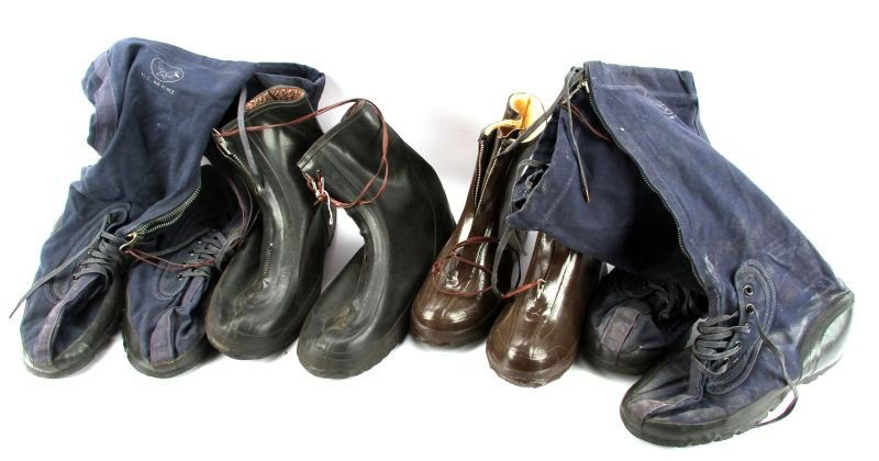FOUR PAIRS OF C.1950S FLYING BOOTS USAF & RCAF: Flying Boots: two pairs of U.S. Air Force blue 1950s N-1A by Randolph MFG., size Large; black 1950s Royal Canadian Air Force marked E.A.K., size 10; brown 1950s RCAF tongue marked "British Rubber 5 Vi